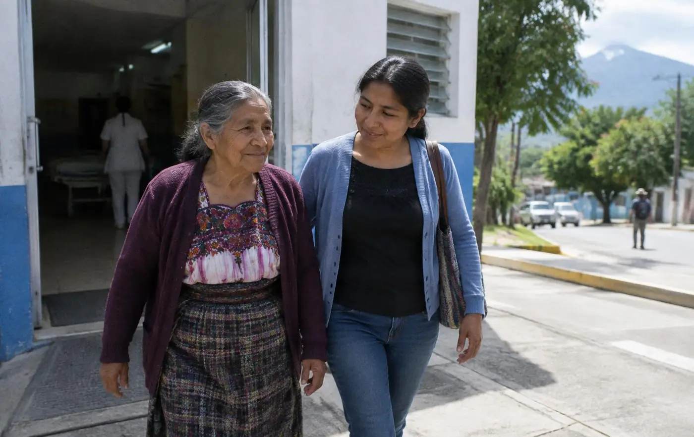A former patient walking out of the hospital with her daughter